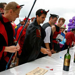 gettyimages-82692691-612x612 PAUILLAC, FRANCE - SEPTEMBER 06: Runners enjoy wine at a chateau during a food and wine break in the Marathon du Medoc race on September 6, 2008 near Pauillac, France. The marathon runs through the famous Medoc wine region prior to the annual harvest. (Photo by Denis Doyle/Getty Images)